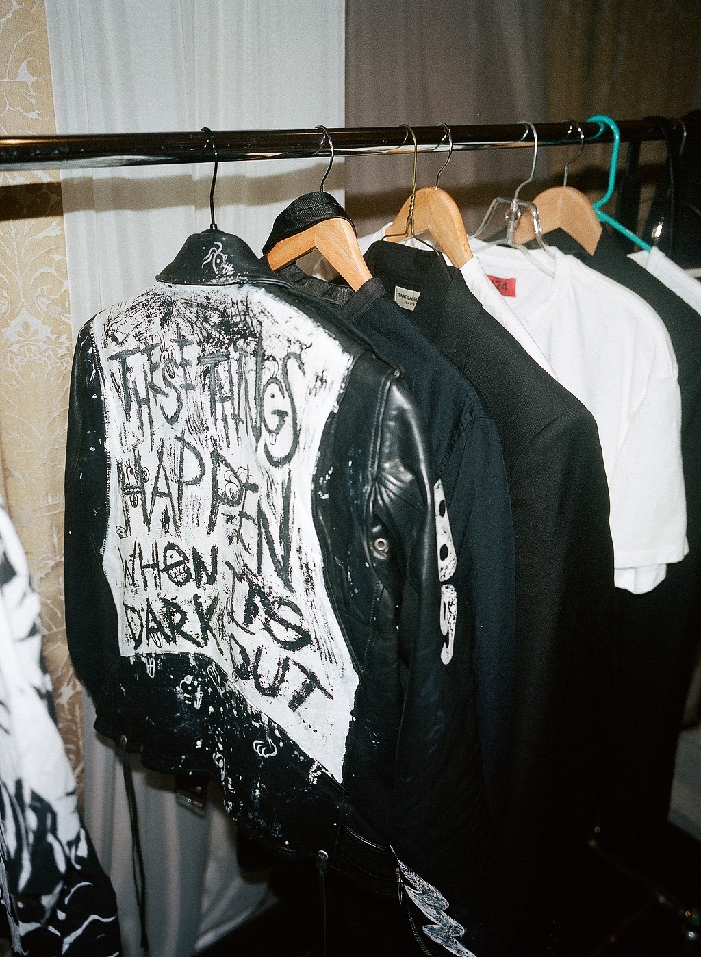 Backstage photo from the photoshoot setting of the album cover